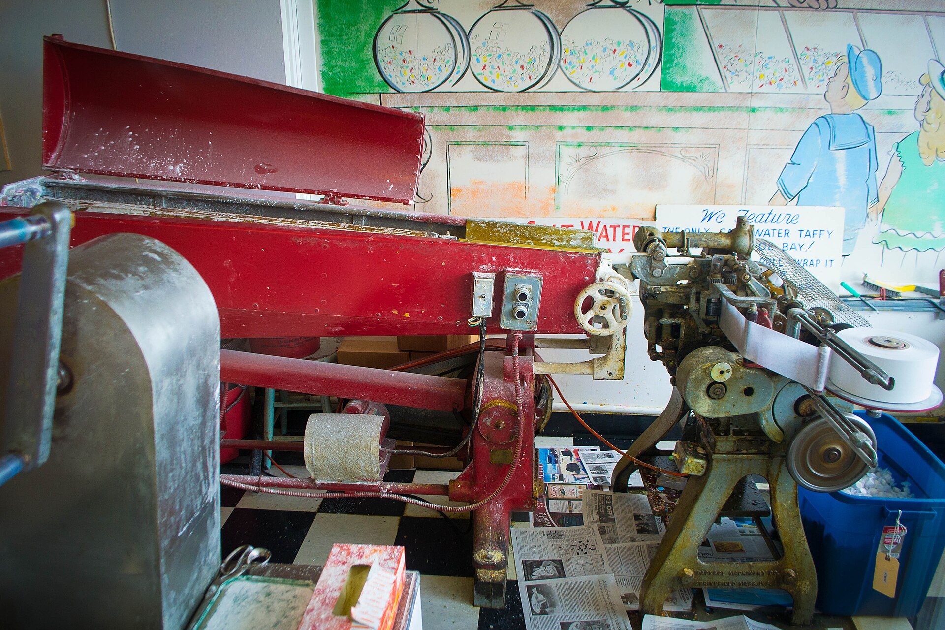 Machines stretching and wrapping salt water taffy